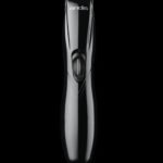 "Andis Slimline Pro Li cordless black T‑blade trimmer with included comb attachments and charging stand" "Slimline Pro Li T‑Blade close‑up showing carbon‑steel blade and ergonomic handle"
