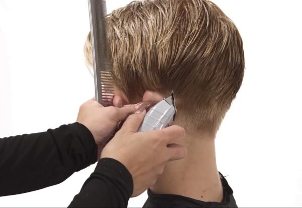 "Andis Professional T-Outliner Trimmer with fine-cutting T-blade for precise detailing and edging"