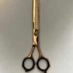 “Professional stainless steel barber scissors hair cutting shears” “Barber scissors with offset handle ergonomic design” “Sharp stainless steel hair cutting shears for salon and barbershop” “High-precision barber scissors for professional hairstyling”