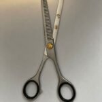 “Professional stainless steel barber scissors hair cutting shears” “Barber scissors with offset handle ergonomic design” “Sharp stainless steel hair cutting shears for salon and barbershop” “High-precision barber scissors for professional hairstyling”