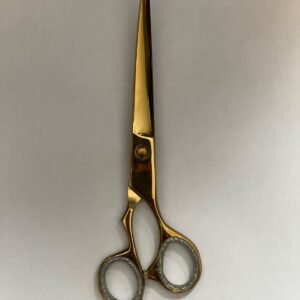 7-inch-professional-barber-scissors-stainless-steel-razor-edge.jpg  "Close-up of professional 7-inch barber scissors with silver stainless steel blades and an ergonomic offset handle."  barber-using-7-inch-shears-for-scissor-over-comb.jpg "Professional barber performing a scissor-over-comb technique using 7-inch hair cutting shears."  razor-edge-hollow-ground-blade-detail.jpg "Macro shot of the hand-honed razor edge on high-carbon steel barber scissors."