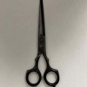 7-inch-professional-barber-scissors-stainless-steel-razor-edge.jpg  "Close-up of professional 7-inch barber scissors with silver stainless steel blades and an ergonomic offset handle."  barber-using-7-inch-shears-for-scissor-over-comb.jpg "Professional barber performing a scissor-over-comb technique using 7-inch hair cutting shears."  razor-edge-hollow-ground-blade-detail.jpg "Macro shot of the hand-honed razor edge on high-carbon steel barber scissors."