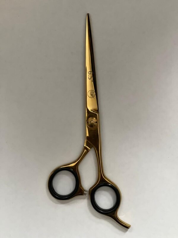 7-inch-professional-barber-scissors-stainless-steel-razor-edge.jpg  "Close-up of professional 7-inch barber scissors with silver stainless steel blades and an ergonomic offset handle."  barber-using-7-inch-shears-for-scissor-over-comb.jpg "Professional barber performing a scissor-over-comb technique using 7-inch hair cutting shears."  razor-edge-hollow-ground-blade-detail.jpg "Macro shot of the hand-honed razor edge on high-carbon steel barber scissors."