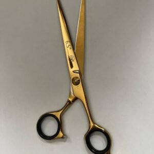 7-inch-professional-barber-scissors-stainless-steel-razor-edge.jpg  "Close-up of professional 7-inch barber scissors with silver stainless steel blades and an ergonomic offset handle."  barber-using-7-inch-shears-for-scissor-over-comb.jpg "Professional barber performing a scissor-over-comb technique using 7-inch hair cutting shears."  razor-edge-hollow-ground-blade-detail.jpg "Macro shot of the hand-honed razor edge on high-carbon steel barber scissors."