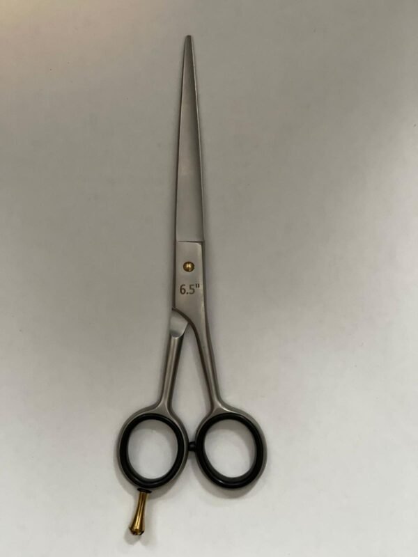 7-inch-professional-barber-scissors-stainless-steel-razor-edge.jpg  "Close-up of professional 7-inch barber scissors with silver stainless steel blades and an ergonomic offset handle."  barber-using-7-inch-shears-for-scissor-over-comb.jpg "Professional barber performing a scissor-over-comb technique using 7-inch hair cutting shears."  razor-edge-hollow-ground-blade-detail.jpg "Macro shot of the hand-honed razor edge on high-carbon steel barber scissors."