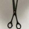 7-inch-professional-barber-scissors-stainless-steel-razor-edge.jpg  "Close-up of professional 7-inch barber scissors with silver stainless steel blades and an ergonomic offset handle."  barber-using-7-inch-shears-for-scissor-over-comb.jpg "Professional barber performing a scissor-over-comb technique using 7-inch hair cutting shears."  razor-edge-hollow-ground-blade-detail.jpg "Macro shot of the hand-honed razor edge on high-carbon steel barber scissors."