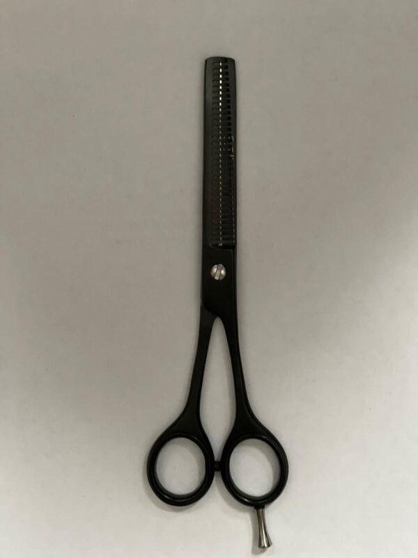 7-inch-professional-barber-scissors-stainless-steel-razor-edge.jpg  "Close-up of professional 7-inch barber scissors with silver stainless steel blades and an ergonomic offset handle."  barber-using-7-inch-shears-for-scissor-over-comb.jpg "Professional barber performing a scissor-over-comb technique using 7-inch hair cutting shears."  razor-edge-hollow-ground-blade-detail.jpg "Macro shot of the hand-honed razor edge on high-carbon steel barber scissors."