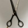 7-inch-professional-barber-scissors-stainless-steel-razor-edge.jpg  "Close-up of professional 7-inch barber scissors with silver stainless steel blades and an ergonomic offset handle."  barber-using-7-inch-shears-for-scissor-over-comb.jpg "Professional barber performing a scissor-over-comb technique using 7-inch hair cutting shears."  razor-edge-hollow-ground-blade-detail.jpg "Macro shot of the hand-honed razor edge on high-carbon steel barber scissors."