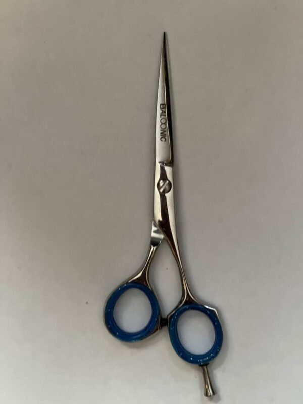 7-inch-professional-barber-scissors-stainless-steel-razor-edge.jpg  "Close-up of professional 7-inch barber scissors with silver stainless steel blades and an ergonomic offset handle."  barber-using-7-inch-shears-for-scissor-over-comb.jpg "Professional barber performing a scissor-over-comb technique using 7-inch hair cutting shears."  razor-edge-hollow-ground-blade-detail.jpg "Macro shot of the hand-honed razor edge on high-carbon steel barber scissors."