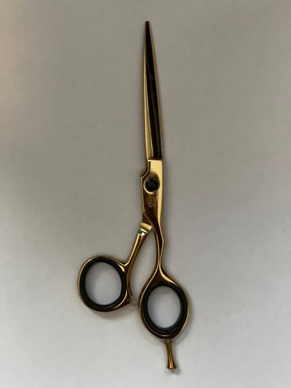 7-inch-professional-barber-scissors-stainless-steel-razor-edge.jpg  "Close-up of professional 7-inch barber scissors with silver stainless steel blades and an ergonomic offset handle."  barber-using-7-inch-shears-for-scissor-over-comb.jpg "Professional barber performing a scissor-over-comb technique using 7-inch hair cutting shears."  razor-edge-hollow-ground-blade-detail.jpg "Macro shot of the hand-honed razor edge on high-carbon steel barber scissors."