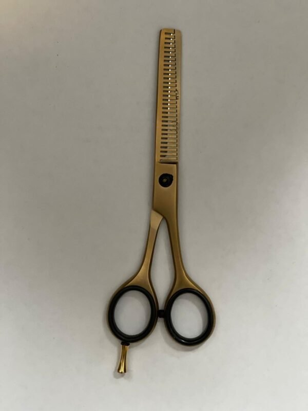 7-inch-professional-barber-scissors-stainless-steel-razor-edge.jpg  "Close-up of professional 7-inch barber scissors with silver stainless steel blades and an ergonomic offset handle."  barber-using-7-inch-shears-for-scissor-over-comb.jpg "Professional barber performing a scissor-over-comb technique using 7-inch hair cutting shears."  razor-edge-hollow-ground-blade-detail.jpg "Macro shot of the hand-honed razor edge on high-carbon steel barber scissors."