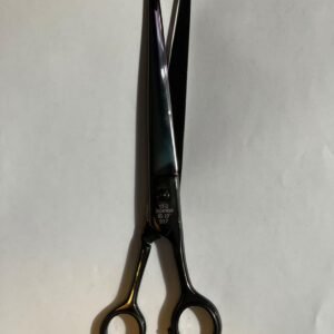 7-inch-professional-barber-scissors-stainless-steel-razor-edge.jpg "Close-up of professional 7-inch barber scissors with silver stainless steel blades and an ergonomic offset handle." barber-using-7-inch-shears-for-scissor-over-comb.jpg "Professional barber performing a scissor-over-comb technique using 7-inch hair cutting shears." razor-edge-hollow-ground-blade-detail.jpg "Macro shot of the hand-honed razor edge on high-carbon steel barber scissors."