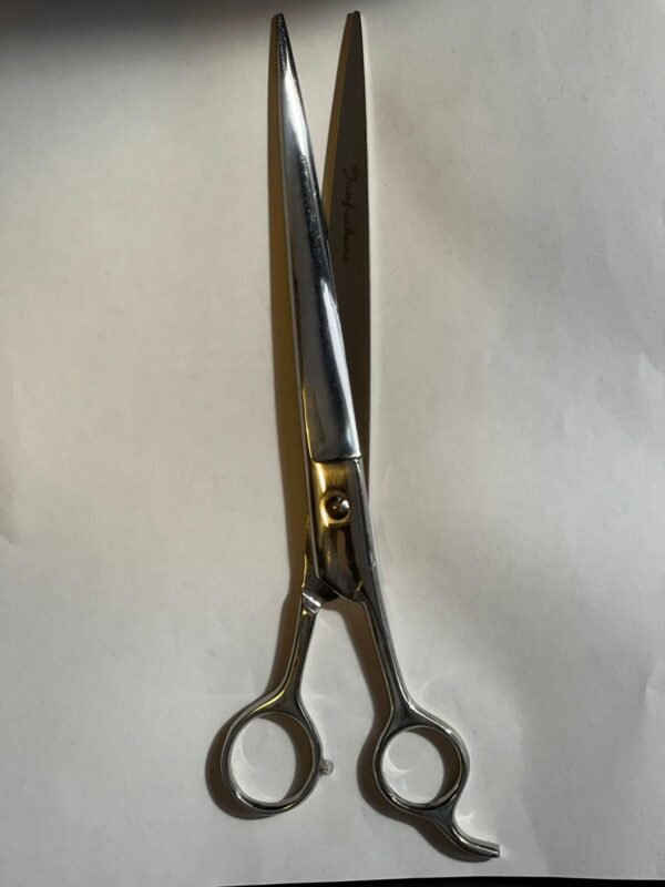 7-inch-professional-barber-scissors-stainless-steel-razor-edge.jpg  "Close-up of professional 7-inch barber scissors with silver stainless steel blades and an ergonomic offset handle."  barber-using-7-inch-shears-for-scissor-over-comb.jpg "Professional barber performing a scissor-over-comb technique using 7-inch hair cutting shears."  razor-edge-hollow-ground-blade-detail.jpg "Macro shot of the hand-honed razor edge on high-carbon steel barber scissors."
