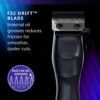 Barber using Wahl Vapor Switch Clipper for a fade haircut